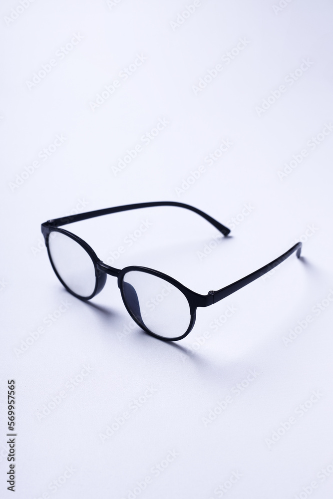 Glasses with transparent lenses are on a white background. Glasses with transparent lenses are on a white background.
