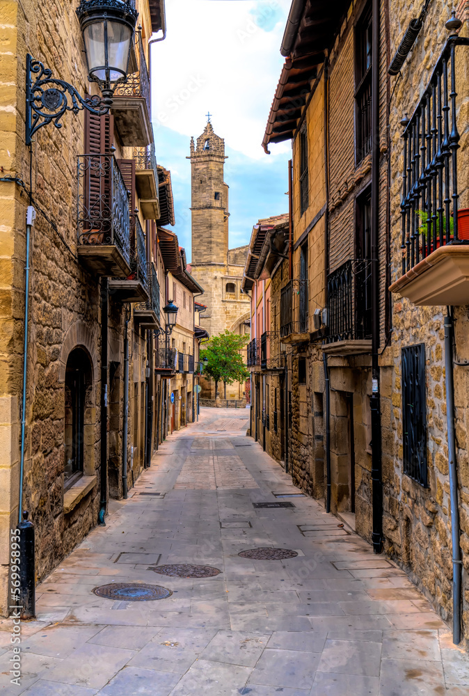Basque Country town Elciego Spain narrow street and church in town centre