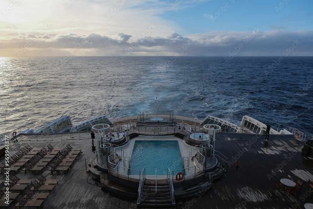 View from deck over bow and side of legendary luxury ocean liner cruise ship on passage during Transatlantic Crossing from Southampton to New York