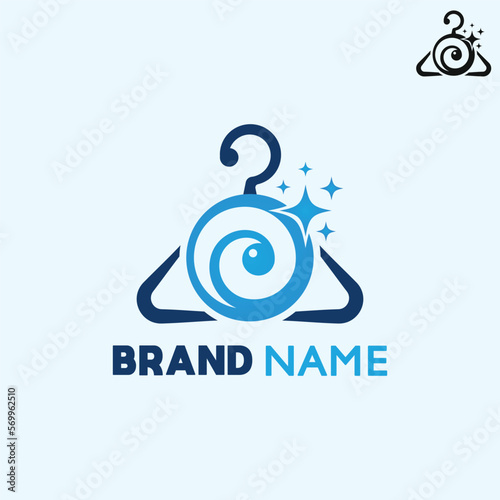 Laundry business logo in the form of a clothes hanger and in the form of a washing machine water flow photo