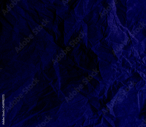 Abstract wrinkled or Free photo crumpled blue paperboard or empty canvas or paper surface or fabric stain background. 