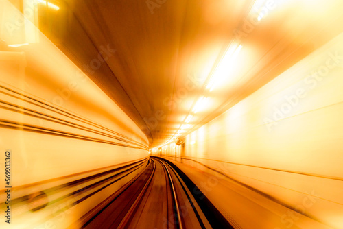 Abstract image of motion blurred tracks and subway tunnel in Copenhagen, Denmark.