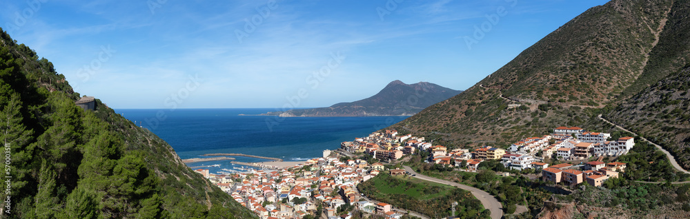 Town on the sea coast, Buggerru, Sardinia, Italy. Sunny Fall Season Day. Panorama