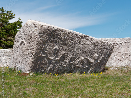 Stecci Medieval Tombstones Graveyards Dugo Polje in Blidinje, BiH. Unesco site. Historic place of interest. The tombstones feature a wide range of decorative motifs and inscriptions. photo