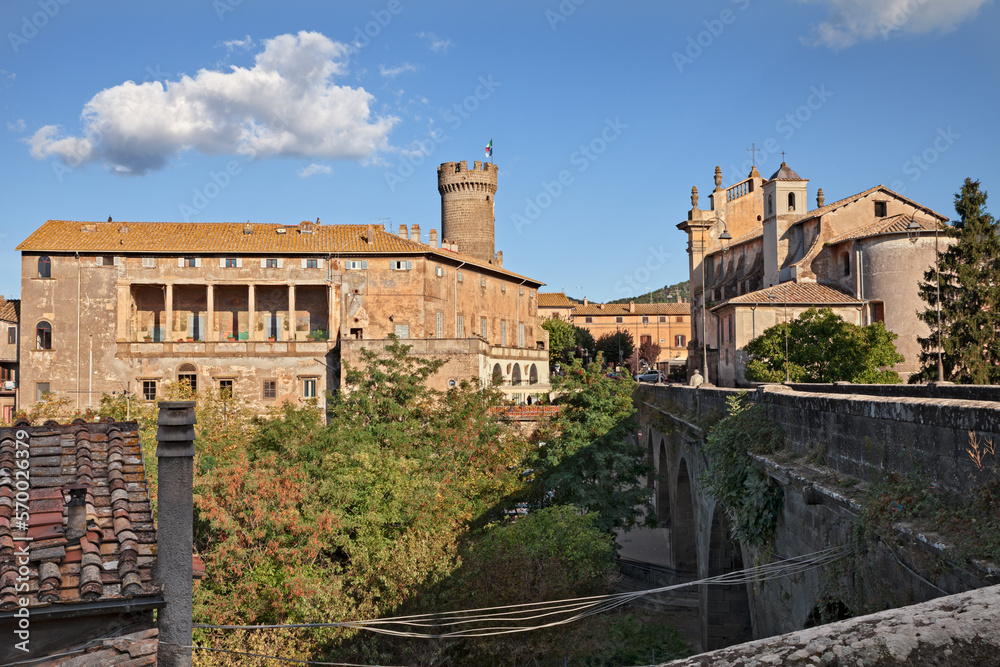 Bagnaia, Viterbo, Lazio, Italy: cityscape of the medieval village with the ancient Ducal Palace anf the old church San Giovanni Battista