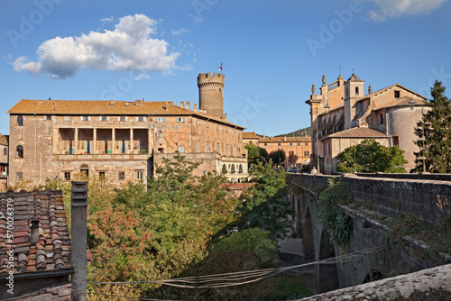 Bagnaia, Viterbo, Lazio, Italy: cityscape of the medieval village with the ancient Ducal Palace anf the old church San Giovanni Battista