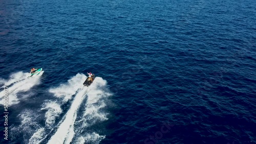 Aerial view of big motor yacht in the Mediterranean sea along the coast in Ibiza, Balearic Island, Spain.