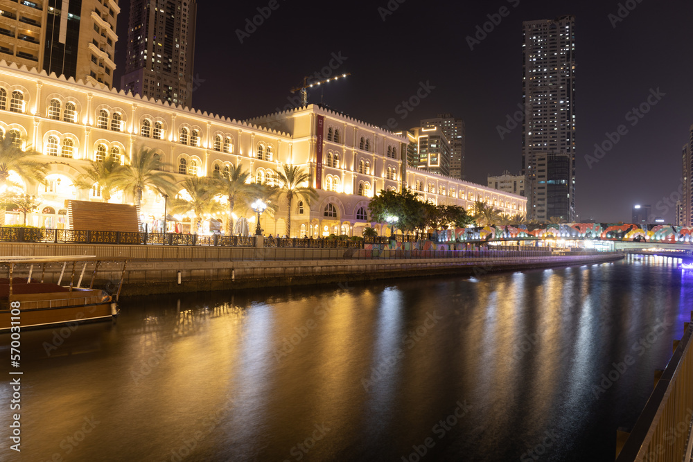 Sharjah urban cityscape skyline night scene., Alqasba canal in Sharjah, United Arab Emirates