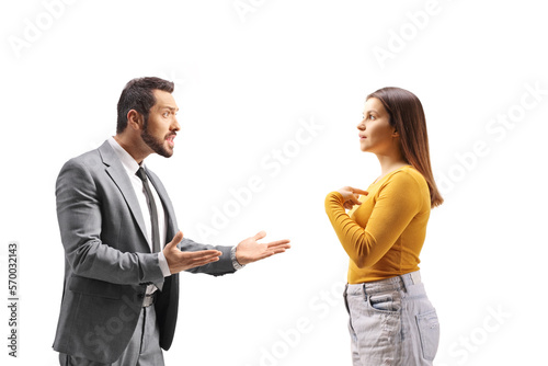 Businessman arguing with a young female