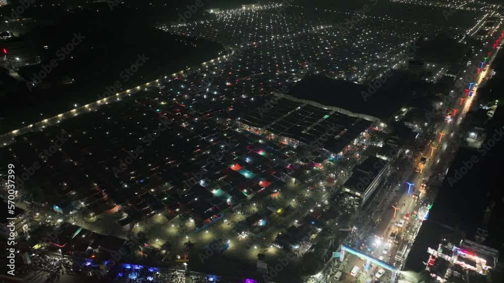 Aerial view of local market colourful tents at Minar Moshjid Tabling for the Global Muslims Congregation at night in Tongi, Dhaka, Bangladesh. Aerial view of local market colourful tents at Minar Moshjid Tabling for the Global Muslims Congregation at night in Tongi, Dhaka, Bangladesh.