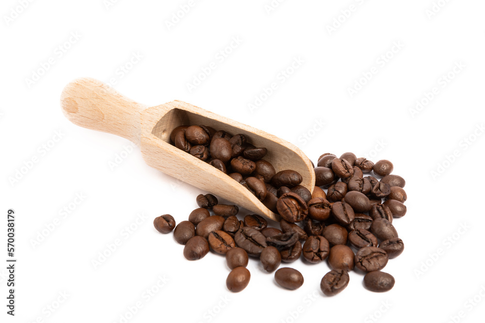 Fototapeta premium Coffee beans in wooden spoon isolated on white background.