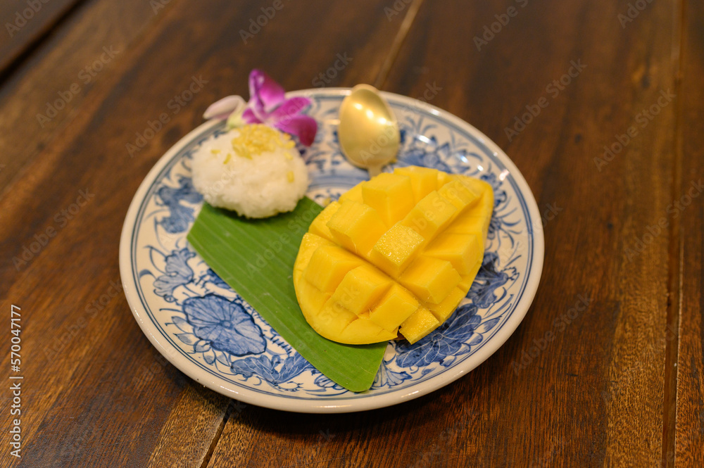 Plate served with Thai sticky rice with mango for dessert Plate served with Thai sticky rice with mango for dessert