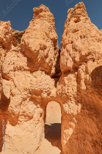 Natural arch doorway through a hiking trail in the desert of Bryce Canyon National Park Utah 