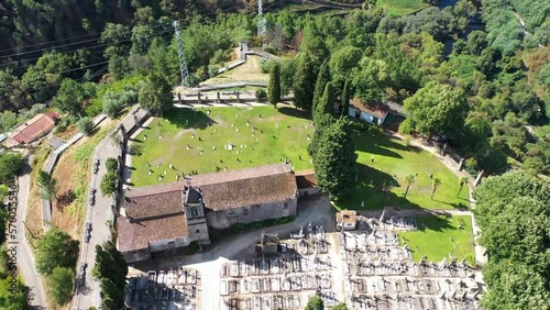 Aerial view of a small church in countryside with a small cemetery in Villareal, Spain. photo