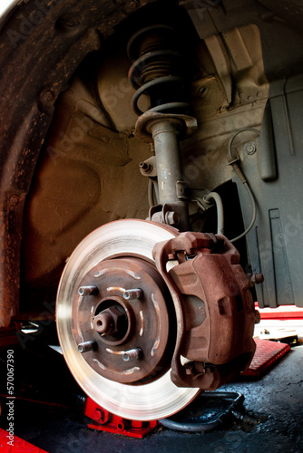 revision and repair of used automotive disc brakes in a workshop