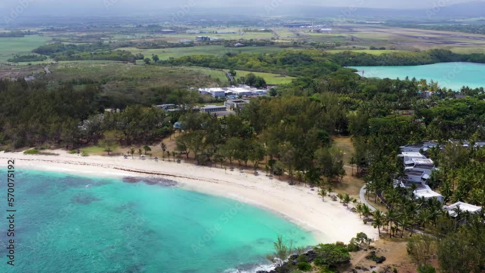 Aerial view of a resort hotel along the coastline on Blue Bay, Mauritius. Aerial view of a resort hotel along the coastline on Blue Bay, Mauritius.