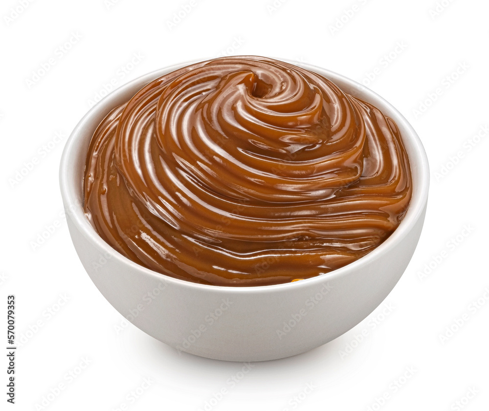 Melted caramel cream isolated on white background, full depth of field