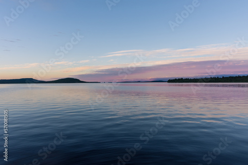 Peaceful landscape of Lake Inari with the midnight sun in Lapland  Finland