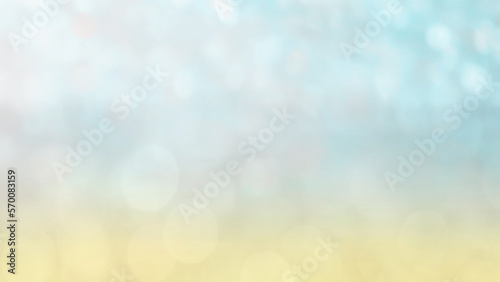 Blurry sea water and sand on beach light bokeh abstract defocused natural background with copy space.