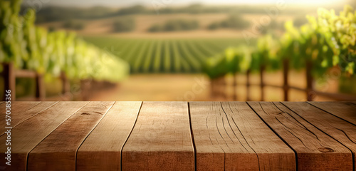 Empty wood table top with blurred vineyard landscape on background, for display or montage your products. Agriculture winery and wine tasting concept. digital art	 photo