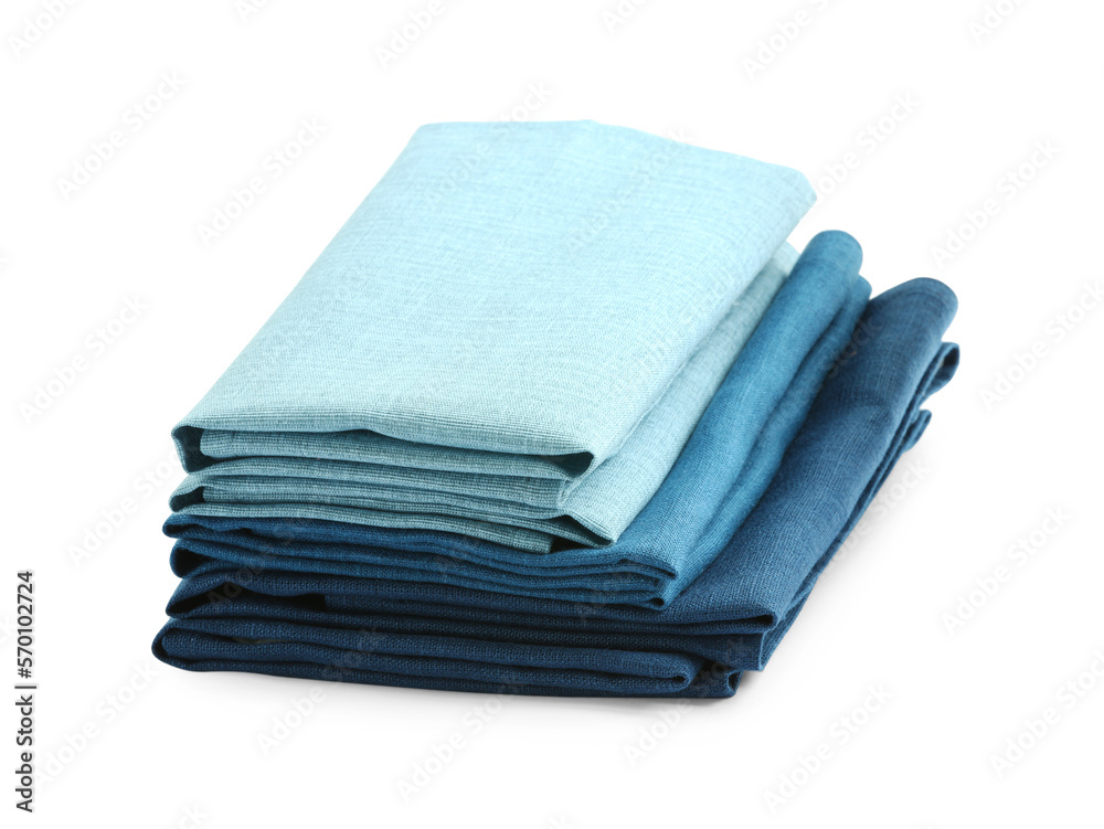 Stack of fabric napkins for table setting isolated on white Stack of fabric napkins for table setting isolated on white