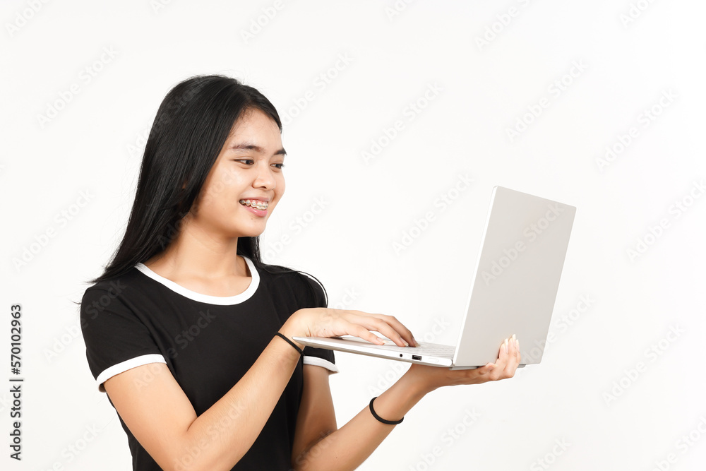 Smiling and Using Laptop Of Beautiful Asian Woman Isolated On White Background Smiling and Using Laptop Of Beautiful Asian Woman Isolated On White Background