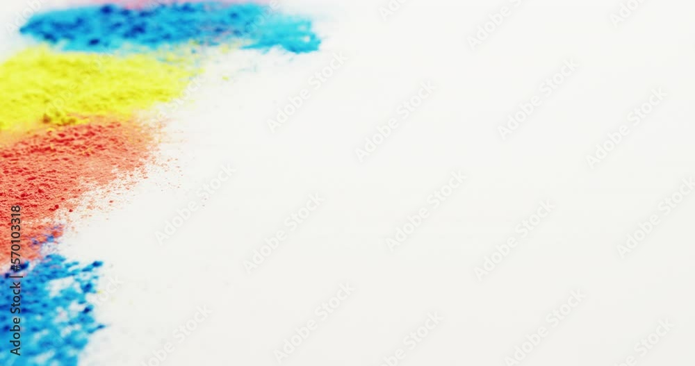 Video of multi coloured powders with copy space on white background