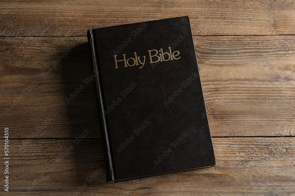 Bible on wooden table, top view. Christian religious book Bible on wooden table, top view. Christian religious book