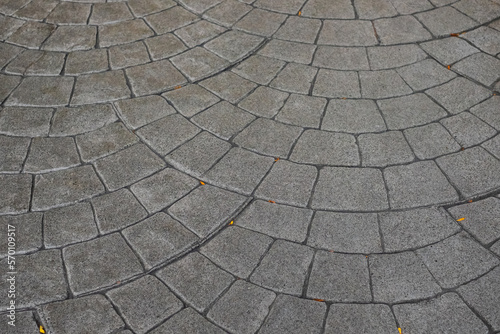 Photo Stamped concrete pavement cobblestones pattern, decorative textures of paving co