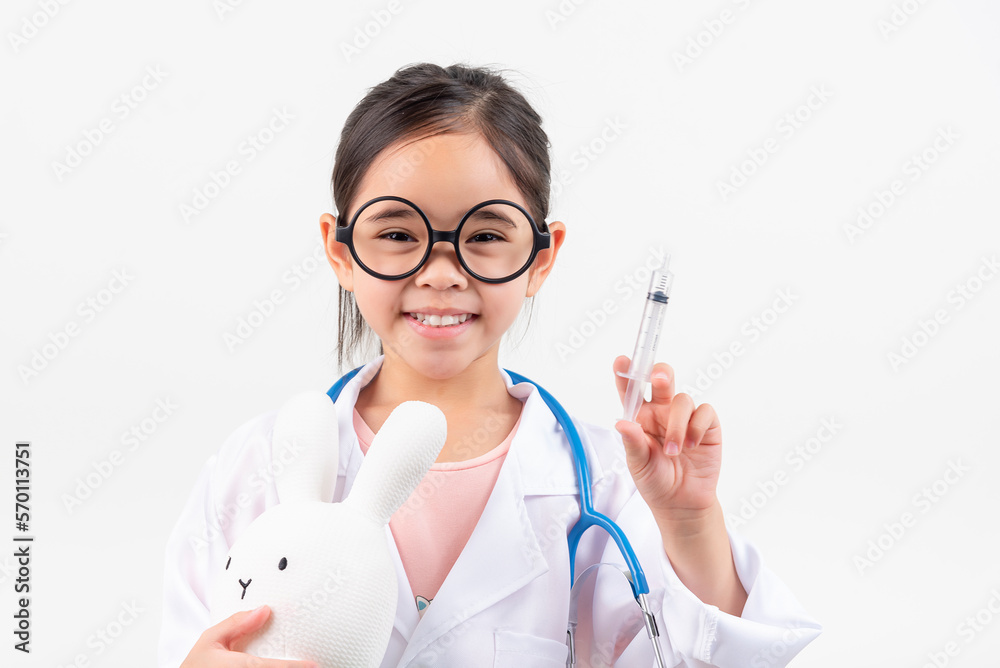 Asia little girl playing doctor isolated on white Asia little girl playing doctor isolated on white