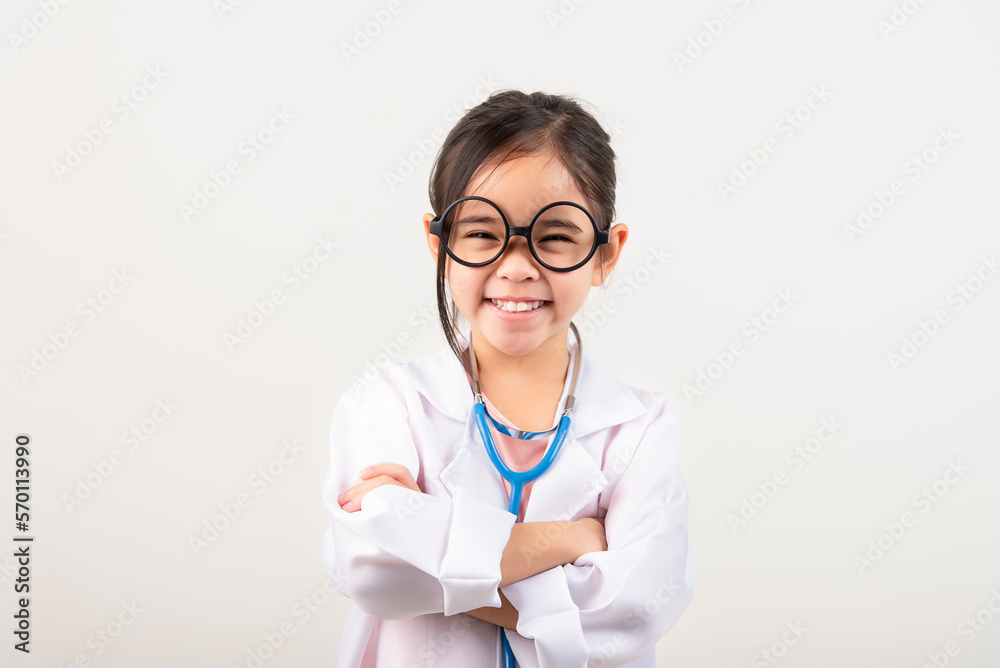 Asia little girl playing doctor isolated on white Asia little girl playing doctor isolated on white