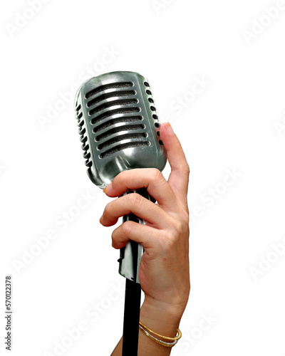 hand holding retro microphone on stage. 