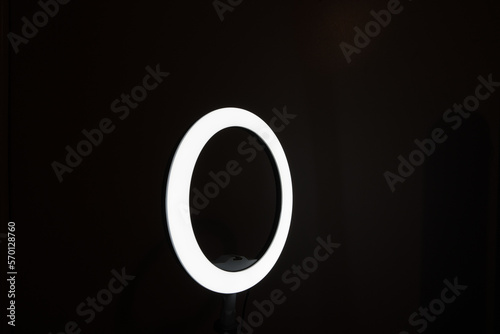 LED ring light with a dark background	

