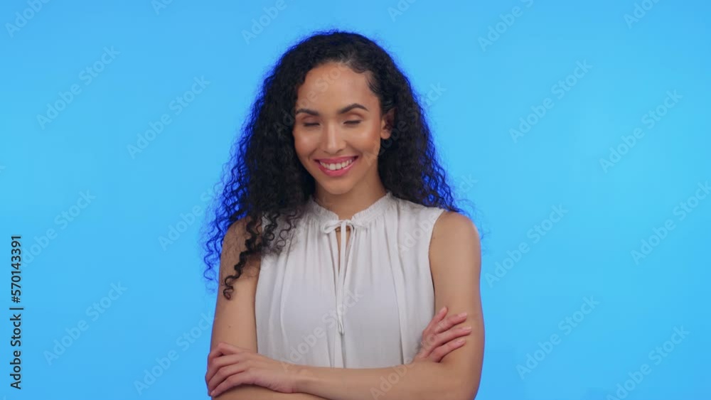 Woman, portrait or arms crossed on isolated blue background in empowerment, pride or assertive body language. Smile, happy or confident model on studio wall mock up in leadership success or about us Woman, portrait or arms crossed on isolated blue background in empowerment, pride or assertive body language. Smile, happy or confident model on studio wall mock up in leadership success or about us