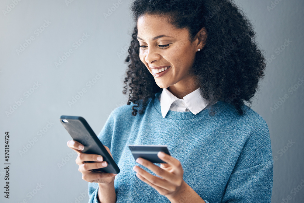 Online shopping, credit card and woman with phone in studio for advertising on grey background. Ecommerce, banking and finance payment with app, transfer or savings on mockup or isolated copy space Online shopping, credit card and woman with phone in studio for advertising on grey background. Ecommerce, banking and finance payment with app, transfer or savings on mockup or isolated copy space