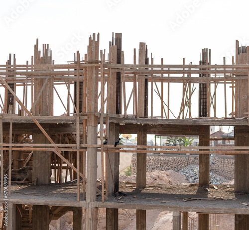 Walls and frame of a building under construction.