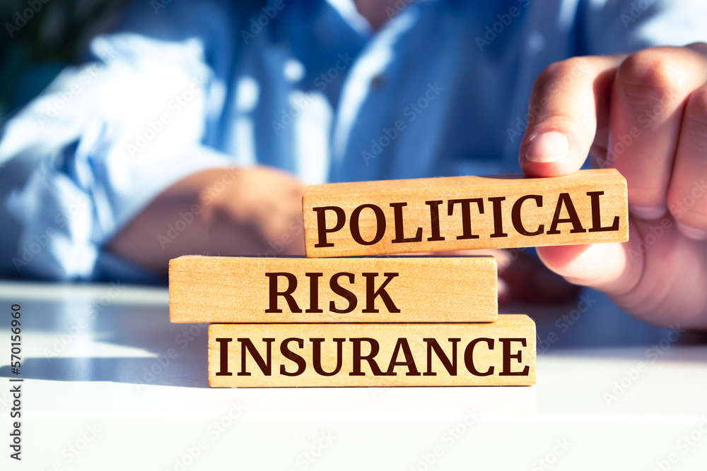 Wooden blocks with words 'Political Risk Insurance'. Wooden blocks with words 'Political Risk Insurance'.
