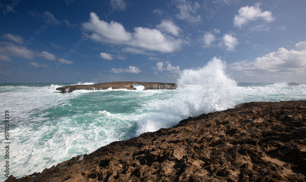 Wave crashing into Laie Point coastline at Kaawa on the North Shore of Oahu Hawaii United States