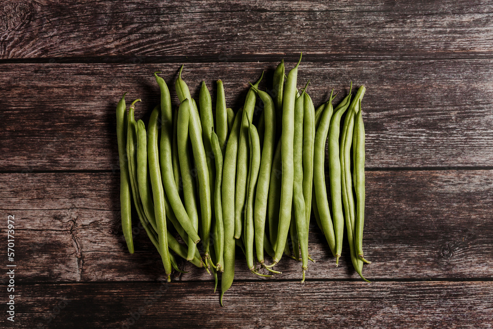 bunch of Fresh green beans at wooden table in Mexico Latin America bunch of Fresh green beans at wooden table in Mexico Latin America