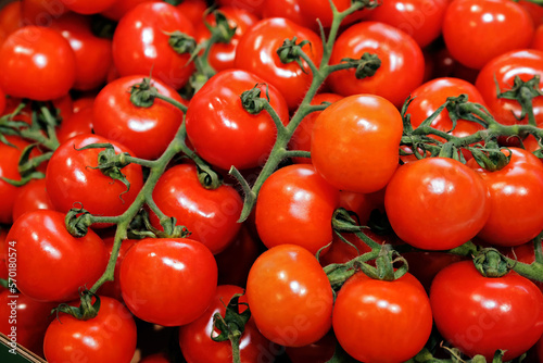 many fresh and ripe tomatoes  closeup