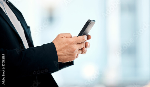 Businessman, phone and hands typing in networking, communication or social media for corporate idea on mockup. Hand of male manager or CEO texting on smartphone app for chatting, browsing or search