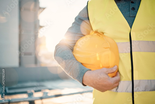 Fotografia Engineering, helmet and hands of construction worker in lens flare for urban development and architecture mission
