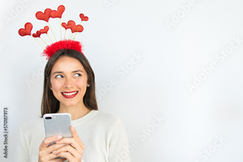 Happy Woman Texting on Valentine's Day in Love