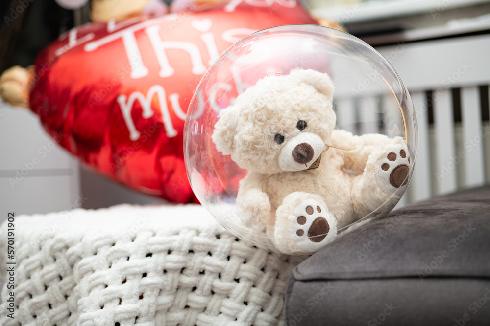 Cute teddy soft bear with red heart. Valentine's day or 8 March celebration