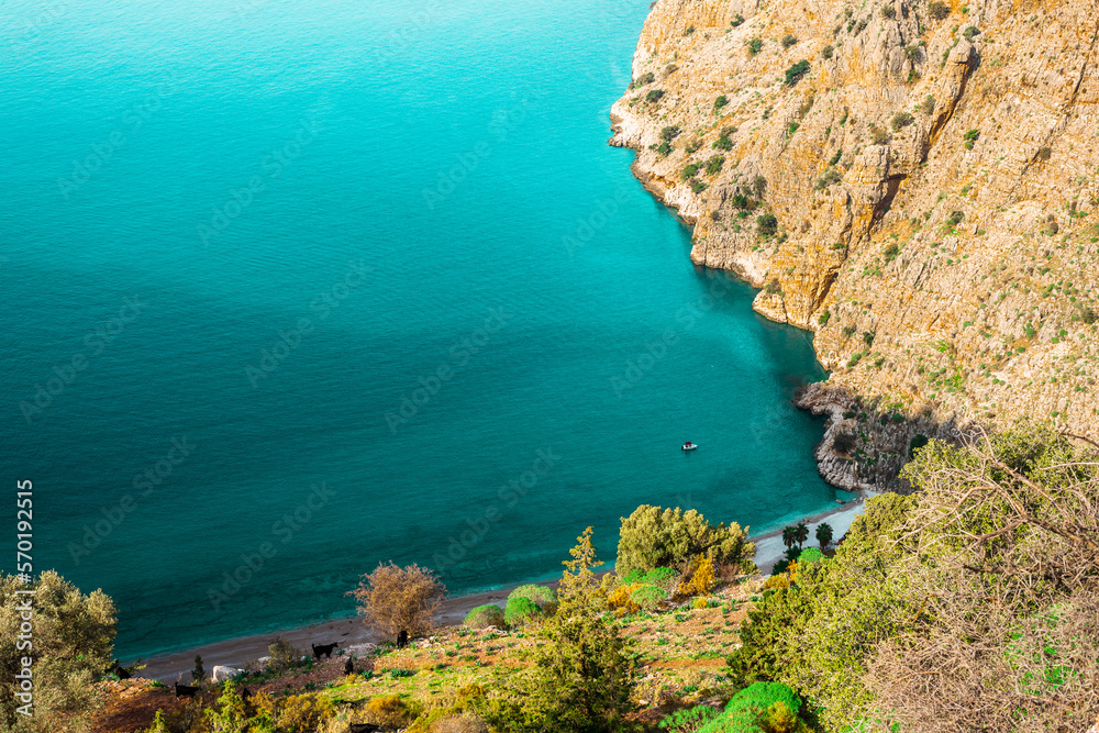 Top view of clear beach and transparent sea of Butterfly Valley. one of the most beautiful beaches in Turkey.
