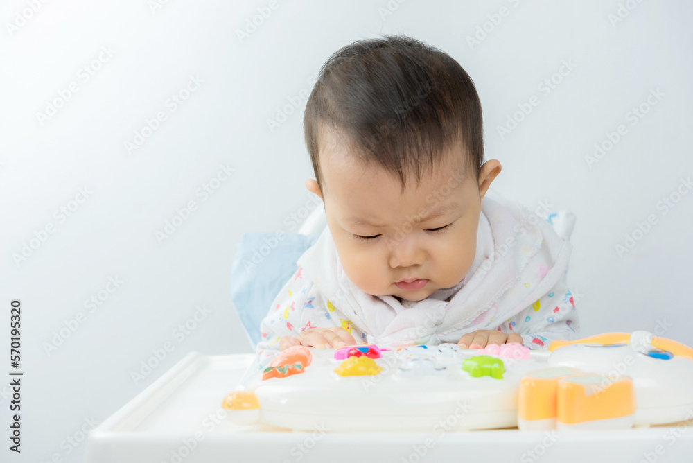 Baby sitting play in high chair,happiness baby,asian baby boy Baby sitting play in high chair,happiness baby,asian baby boy