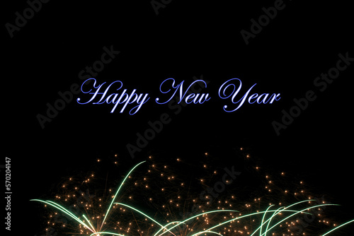 Real fireworks photography and abstract colorful fireworks background with Happy New Year lettering