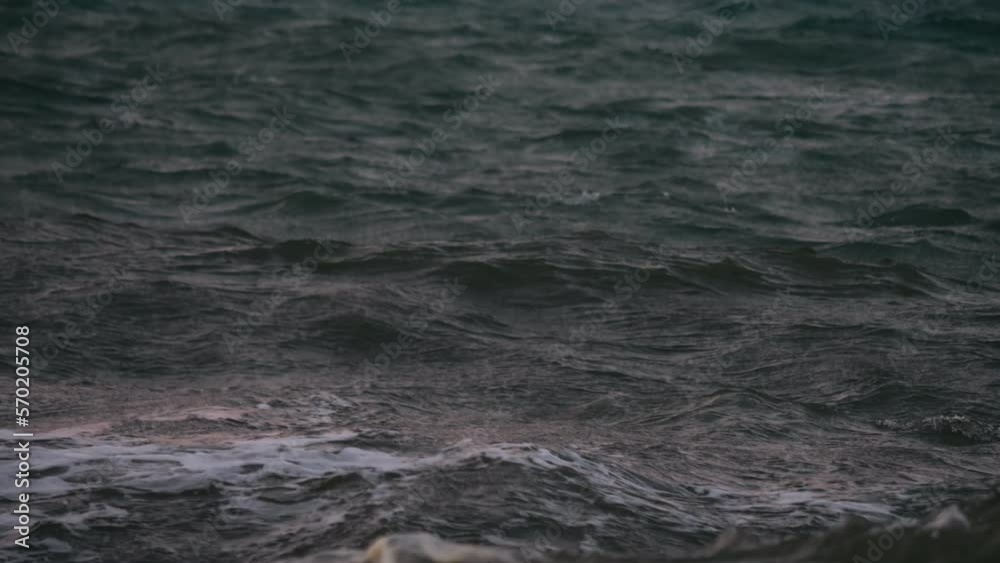 Rough sea during a cloudy sunset. Stormy weather. Rough sea during a cloudy sunset. Stormy weather.