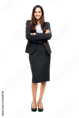 A gorgeous young indian business excutive or and entrepreneur looking confident with her hands crossed and in a business suit isolated on a png background. photo