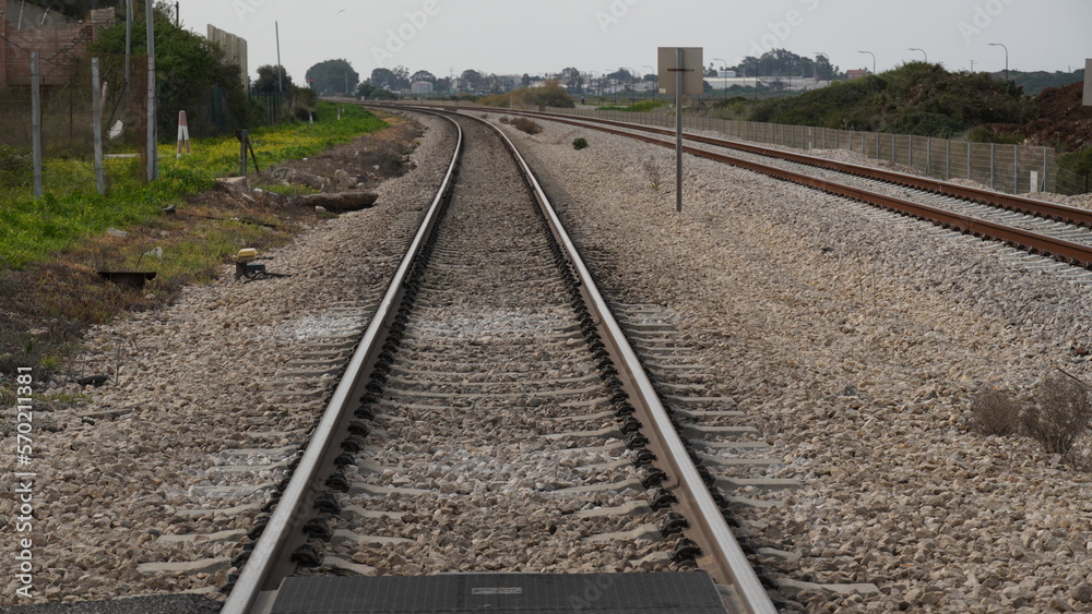 Obraz premium A view of the rails of a train. The length of the railway track. Israel